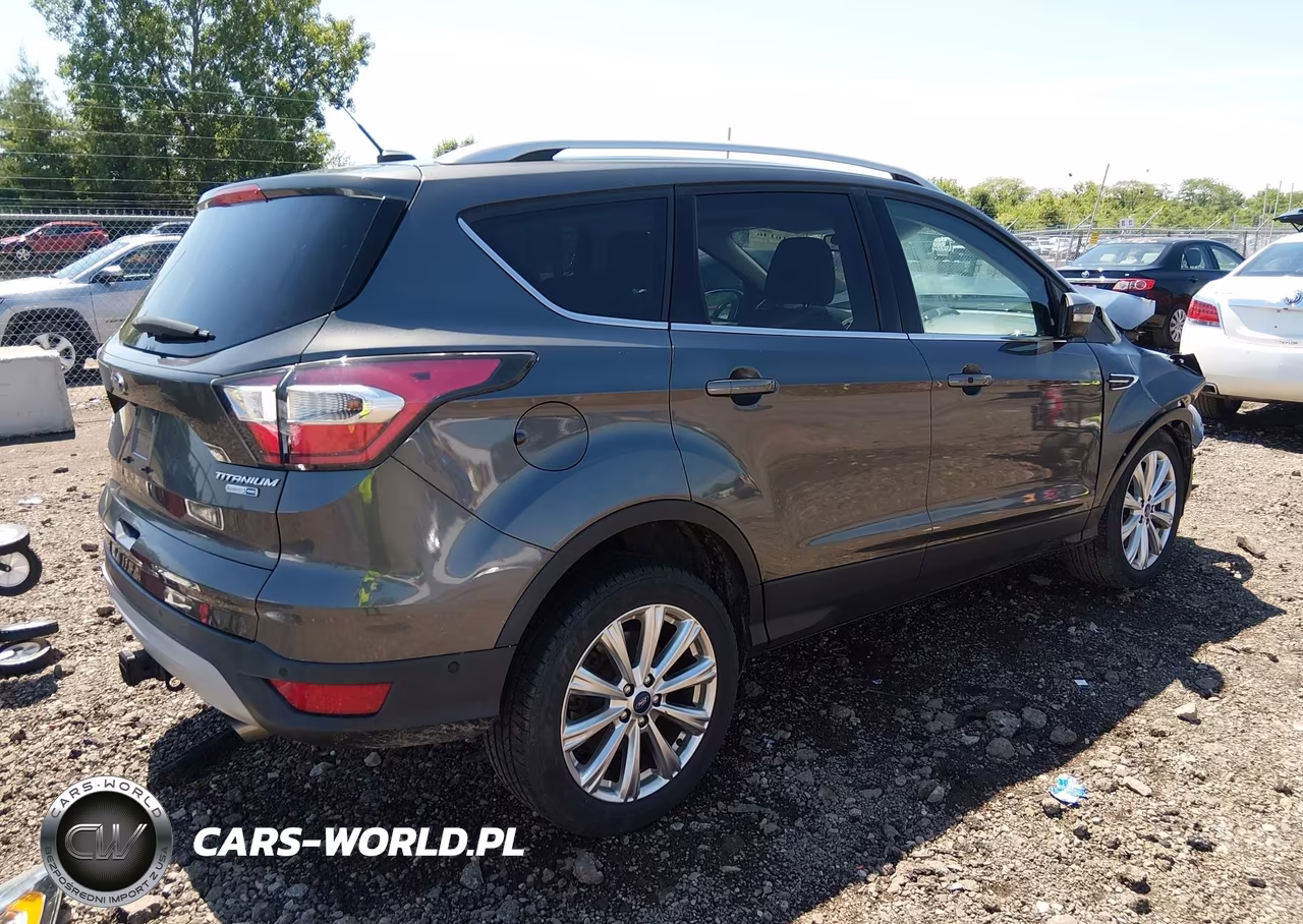 2017 Ford Escape Titanium VIN:1FMCU9J99HUA37759 - 4