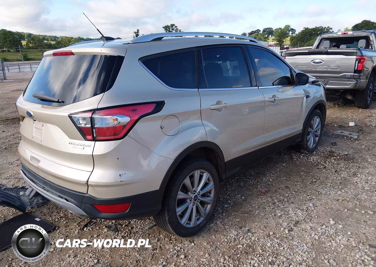 2017 Ford Escape Titanium VIN:1FMCU9J99HUE18365 - 4