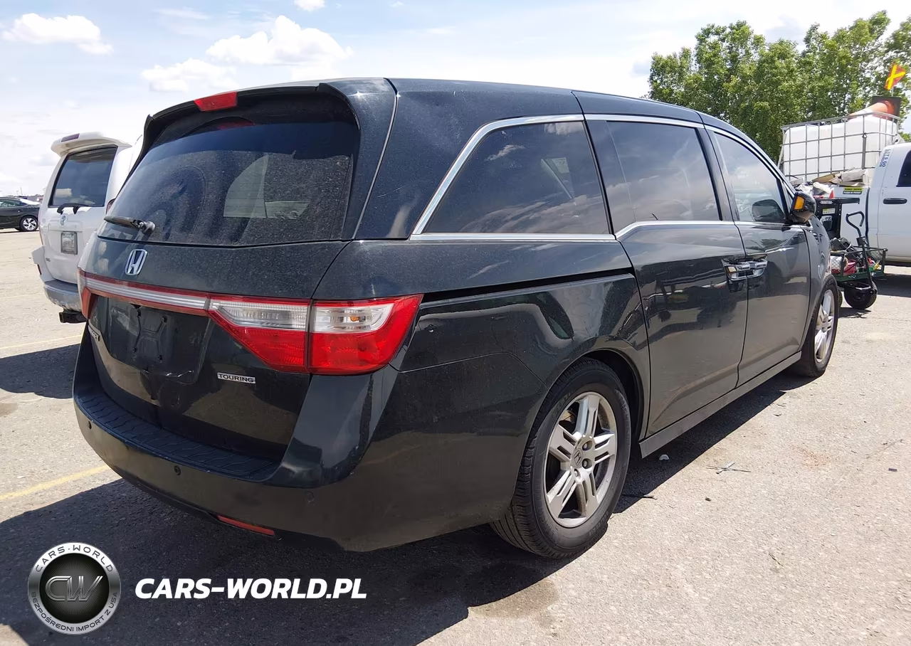 2011 Honda Odyssey Touring-Touring Elite VIN:5FNRL5H94BB089915 - 4
