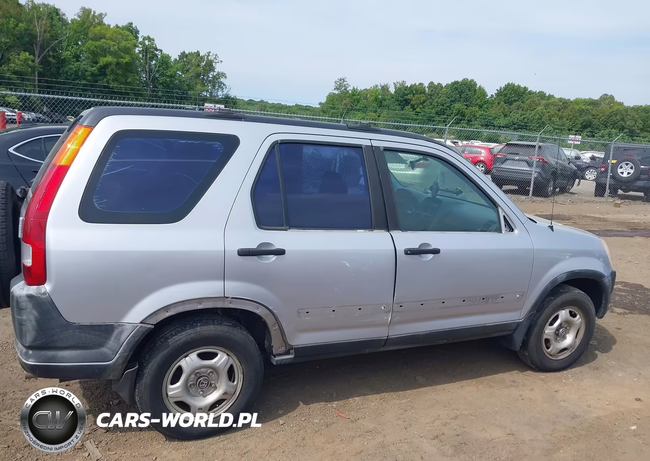 2002 Honda Cr-V Lx VIN:JHLRD68412C006173 - 14