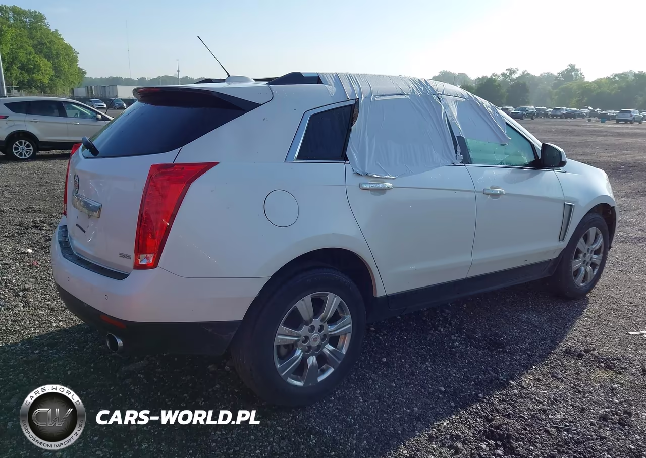 2015 Cadillac Srx Luxury Collection VIN:3GYFNEE37FS622327 - 4
