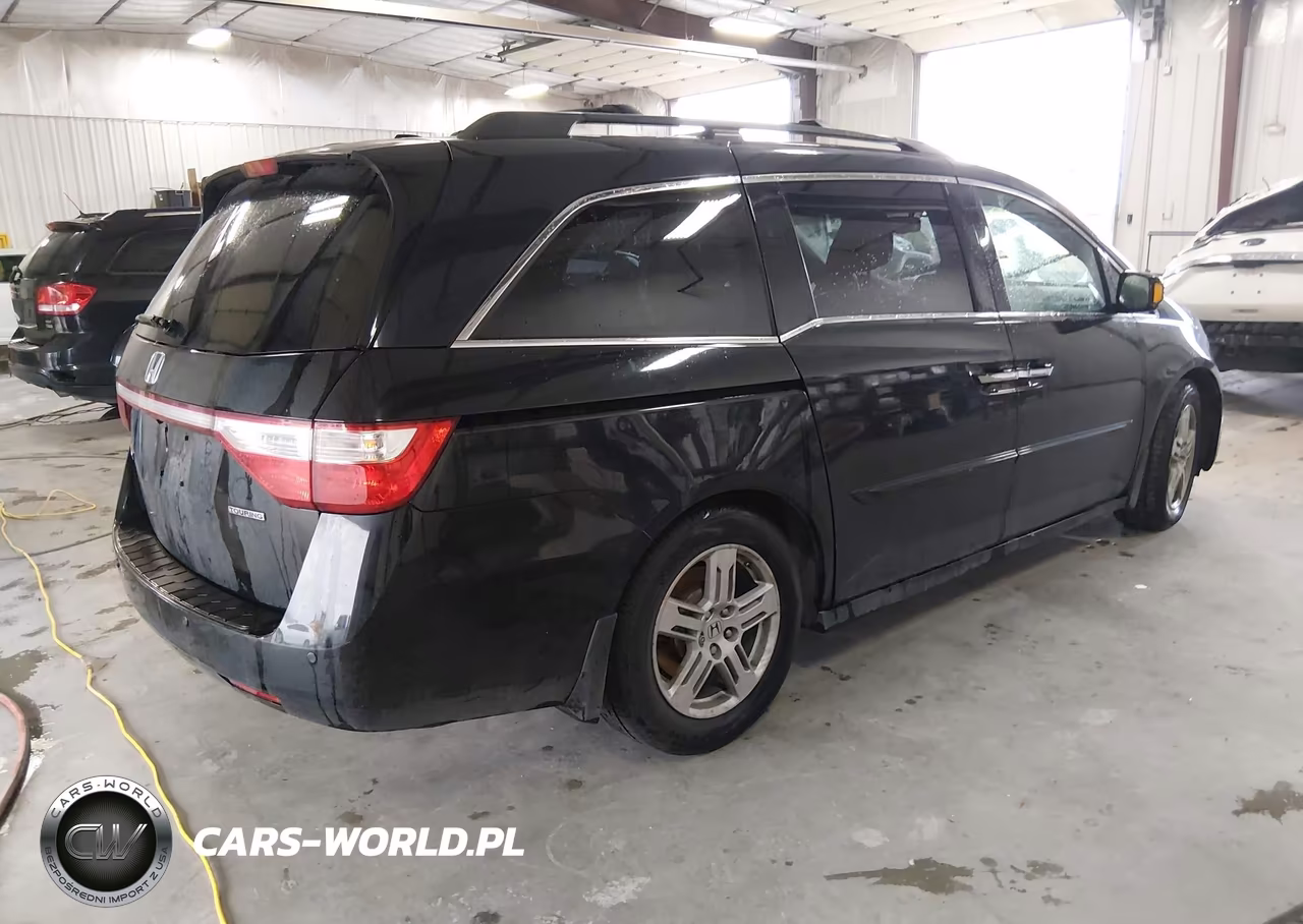 2011 Honda Odyssey Touring-Touring Elite VIN:5FNRL5H91BB035052 - 4