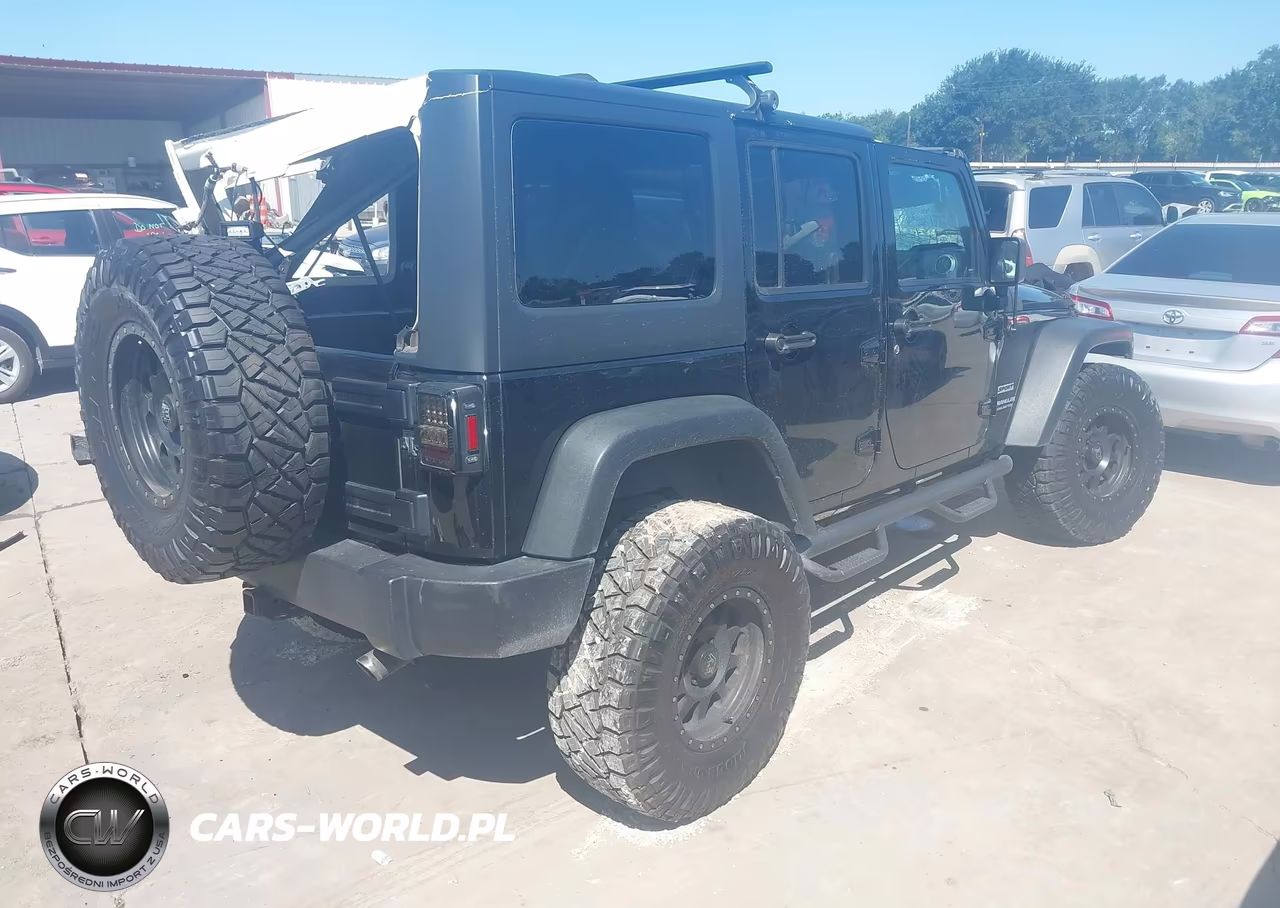 2015 Jeep Wrangler Unlimited Sport VIN:1C4BJWDG9FL742274 - 4