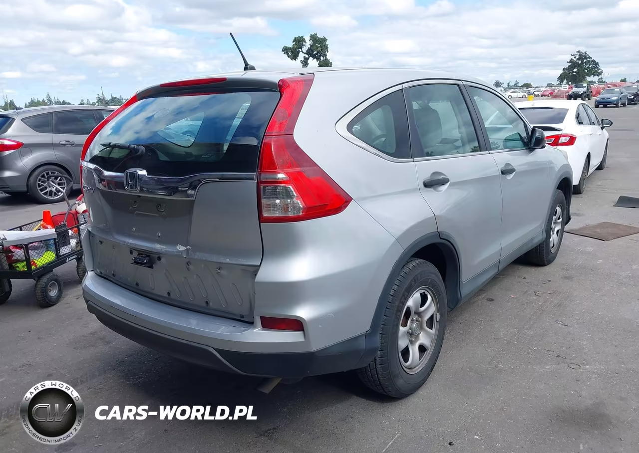 2015 Honda Cr-V Lx VIN:3CZRM3H31FG716738 - 4