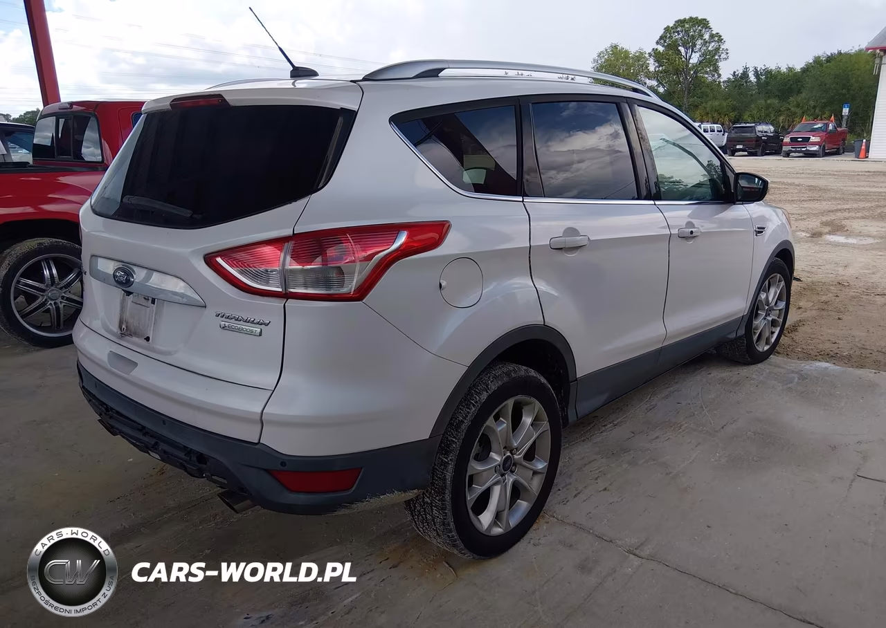 2015 Ford Escape Titanium VIN:1FMCU0JX9FUC24054 - 4