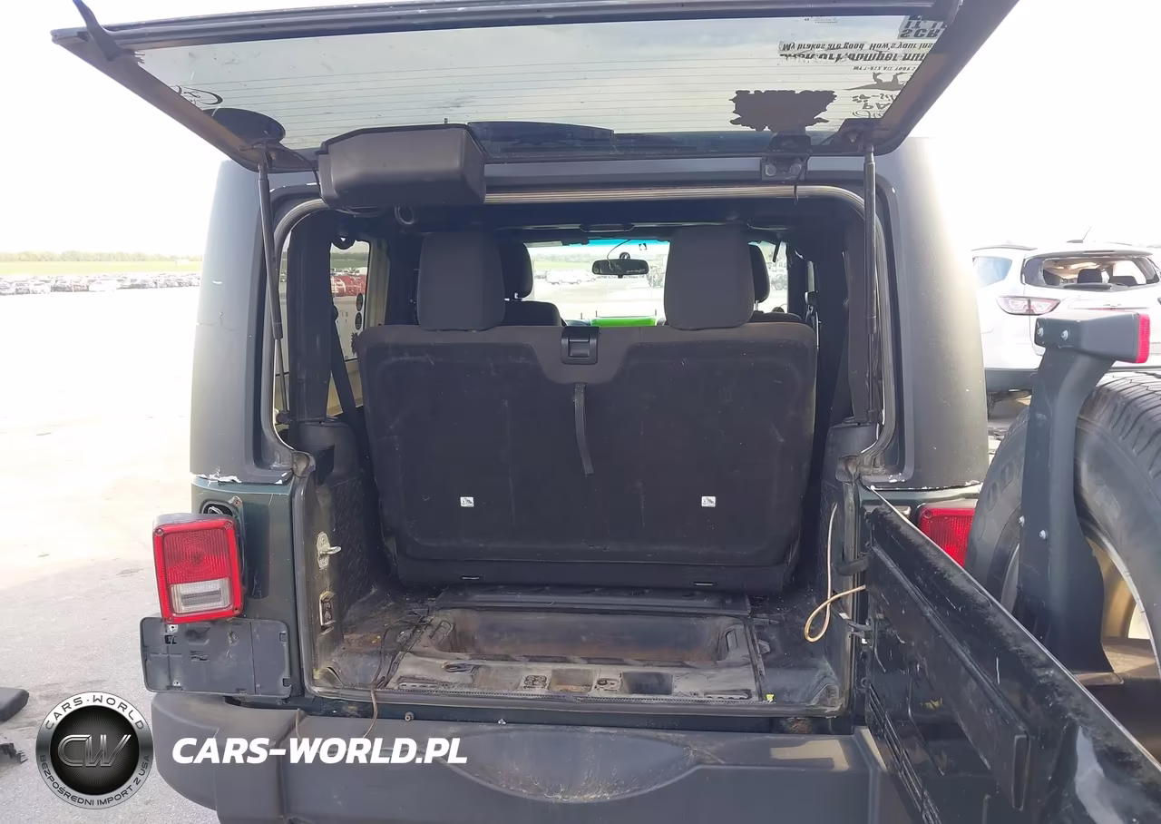 2011 Jeep Wrangler Sport VIN:1J4AA2D18BL570128 - 18