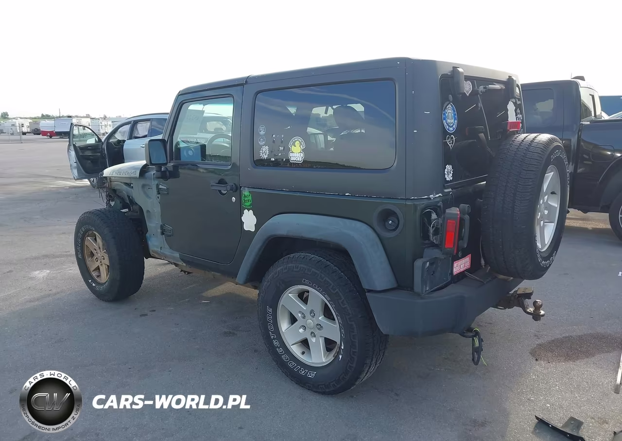 2011 Jeep Wrangler Sport VIN:1J4AA2D18BL570128 - 3