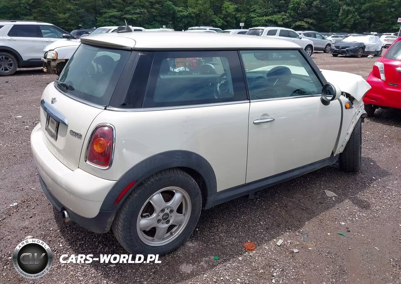 2010 Mini Cooper VIN:WMWMF3C52ATZ27037 - 4