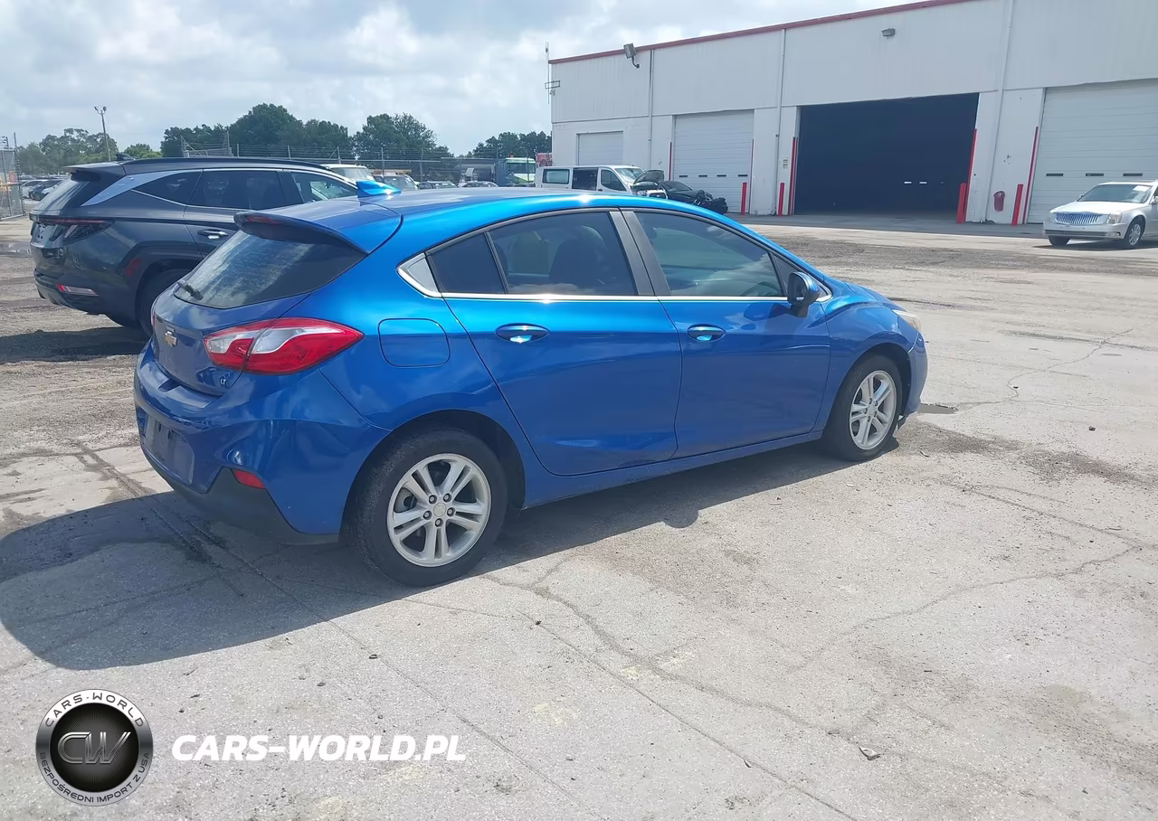 2018 Chevrolet Cruze Lt Auto VIN:3G1BE6SM5JS607639 - 4