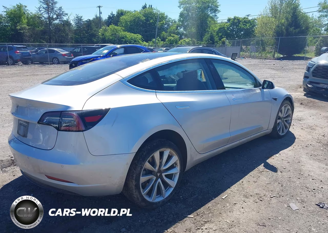 2018 Tesla Model 3 Long Range-Mid Range VIN:5YJ3E1EA8JF031117 - 4