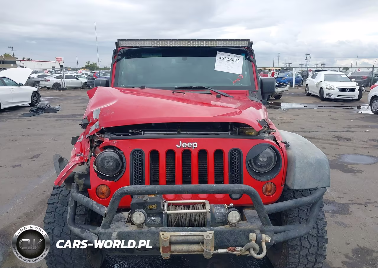 2012 Jeep Wrangler Unlimited Sport VIN:1C4BJWDG9CL133228 - 12