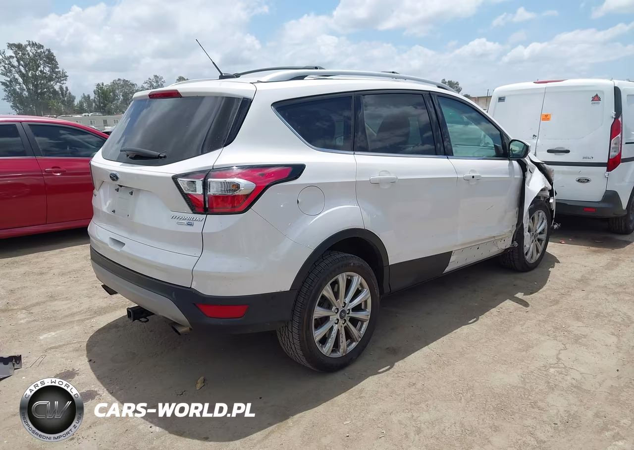 2017 Ford Escape Titanium VIN:1FMCU9J9XHUC26386 - 4