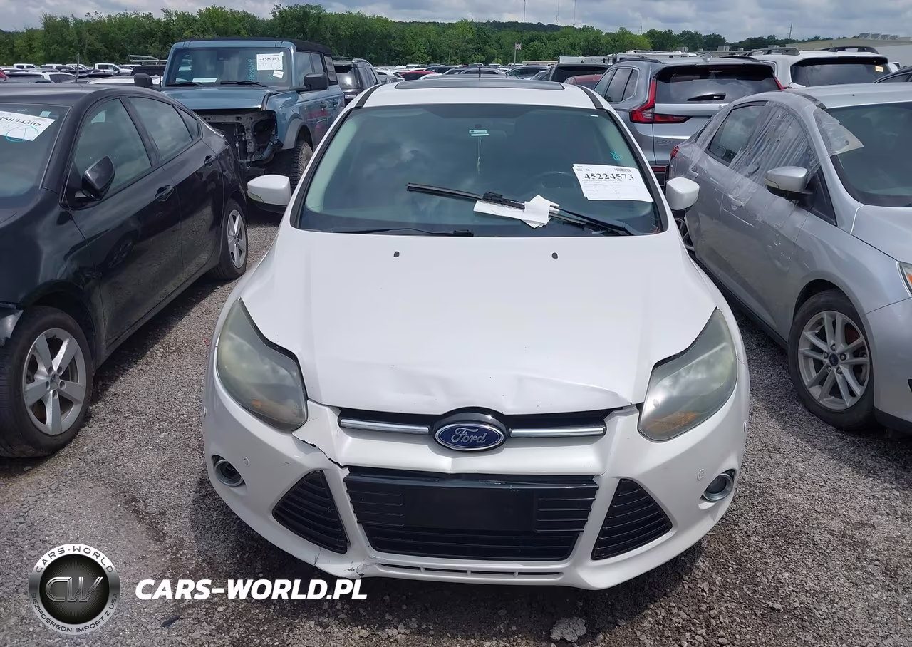 2013 Ford Focus Titanium VIN:1FADP3N22DL144572 - 6
