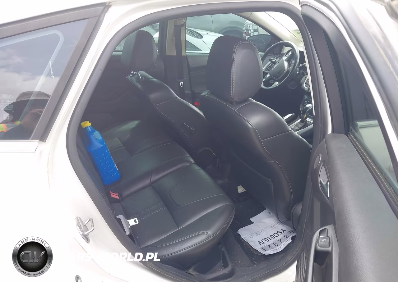 2013 Ford Focus Titanium VIN:1FADP3N22DL144572 - 8