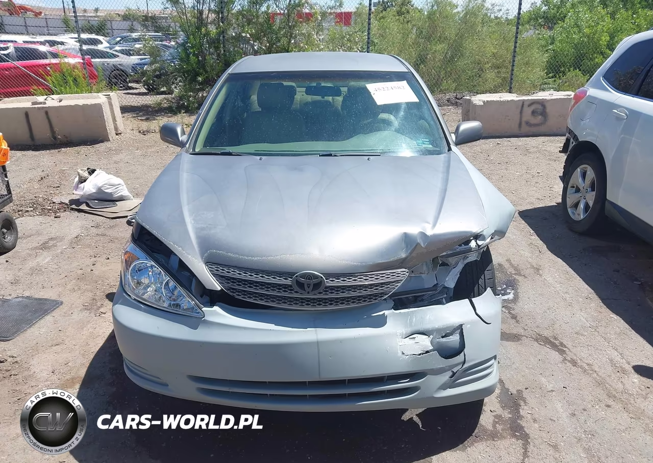 2002 Toyota Camry Le VIN:JTDBE32K620076500 - 12