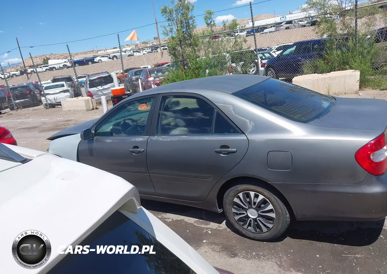 2002 Toyota Camry Le VIN:JTDBE32K620076500 - 14