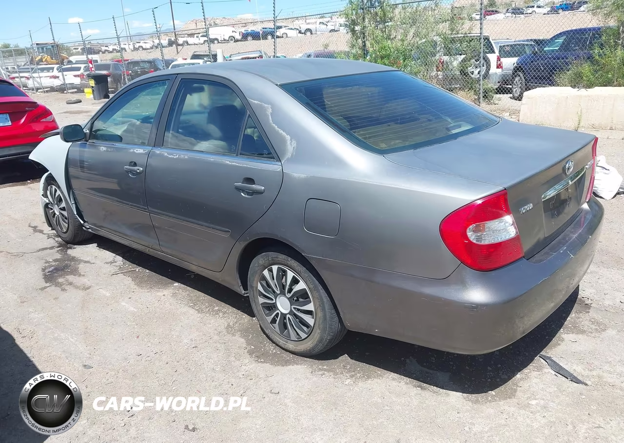 2002 Toyota Camry Le VIN:JTDBE32K620076500 - 3
