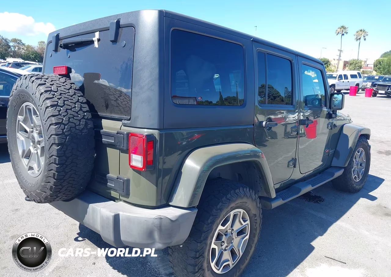 2015 Jeep Wrangler Unlimited Rubicon VIN:1C4HJWFG6FL570759 - 4