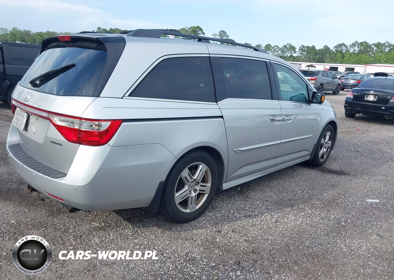 2012 Honda Odyssey Touring-Touring Elite VIN:5FNRL5H97CB072849 - 4