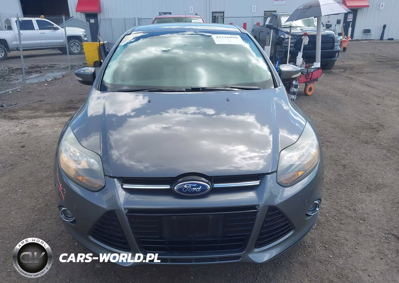 2013 Ford Focus Titanium VIN:1FADP3N27DL119926 - 12