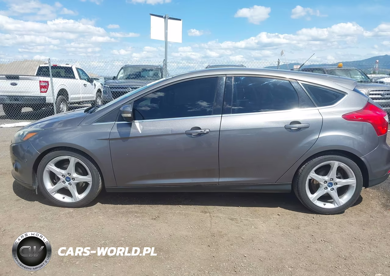 2013 Ford Focus Titanium VIN:1FADP3N27DL119926 - 14