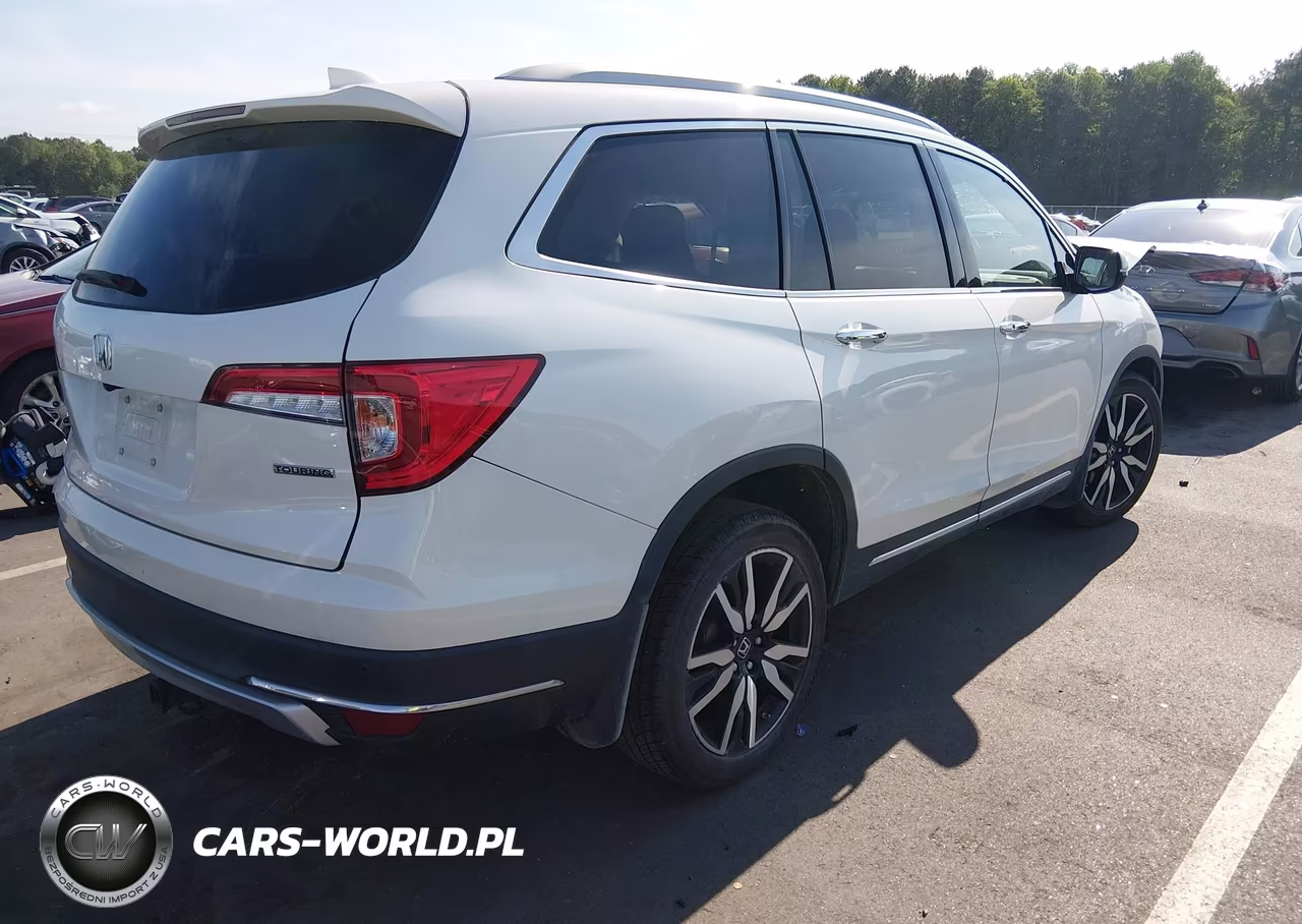 2019 Honda Pilot Touring VIN:5FNYF5H94KB020161 - 4