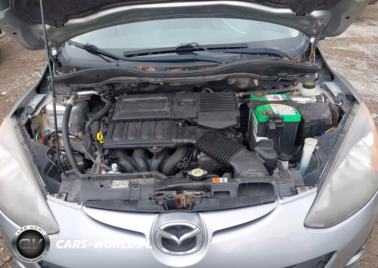 2011 Mazda Mazda2 Touring VIN:JM1DE1HZ3B0101662 - 10