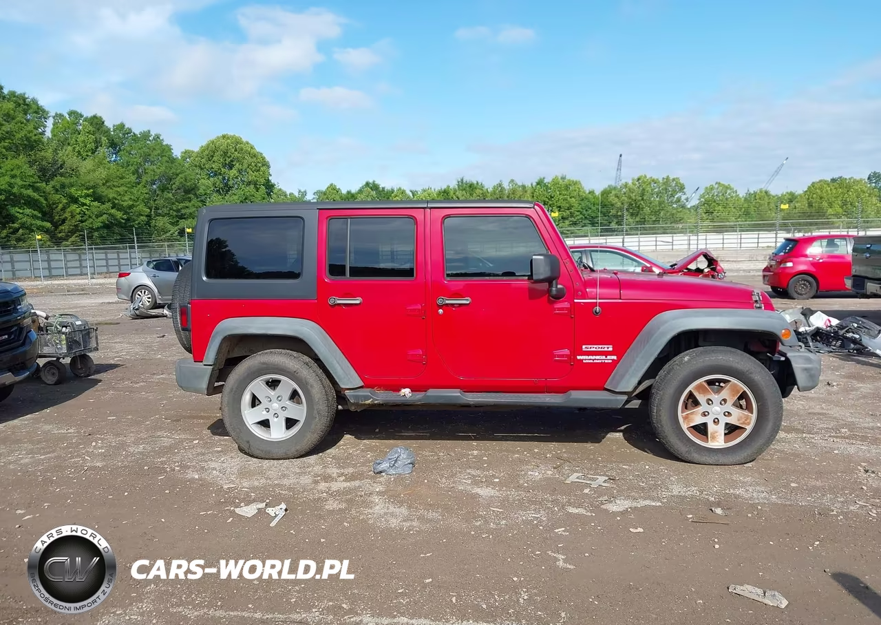 2011 Jeep Wrangler Unlimited Sport VIN:1J4BA3H12BL557461 - 13