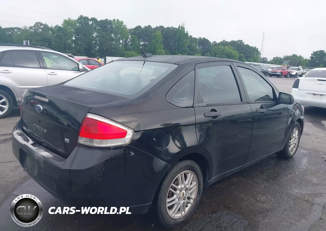 2009 Ford Focus Se VIN:1FAHP35N09W180228 - 4