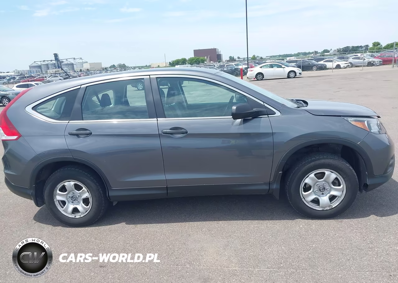 2013 Honda Cr-V Lx VIN:2HKRM4H33DH660009 - 13