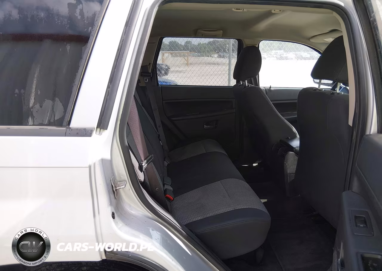 2009 Jeep Grand Cherokee Laredo VIN:1J8GR48K09C511309 - 8