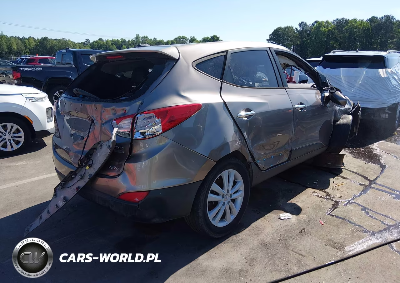 2012 Hyundai Tucson Limited VIN:KM8JUCAC8CU538005 - 4