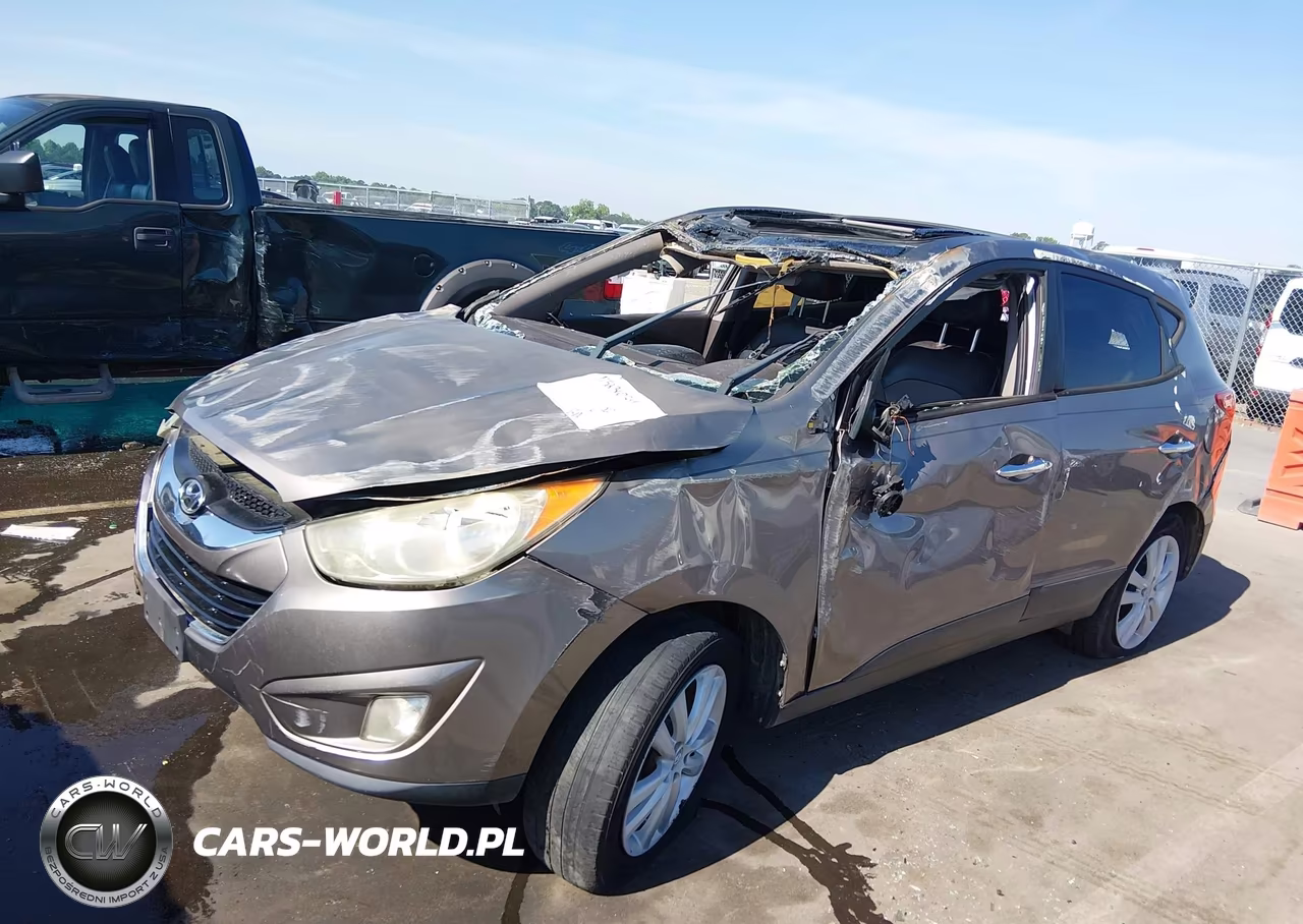 2012 Hyundai Tucson Limited VIN:KM8JUCAC8CU538005 - 6
