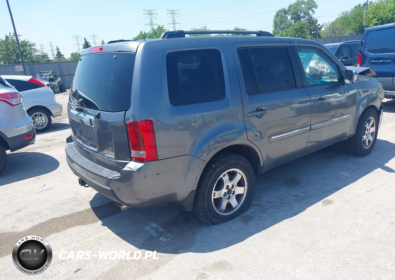 2011 Honda Pilot Touring VIN:5FNYF4H91BB100818 - 4