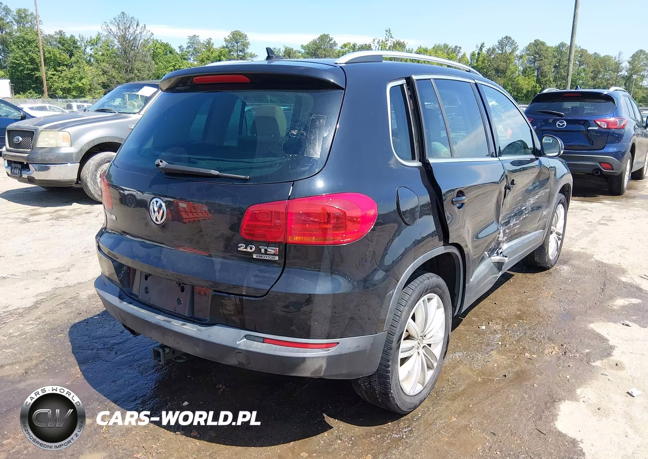 2014 Volkswagen Tiguan Sel VIN:WVGBV3AX7EW549282 - 4