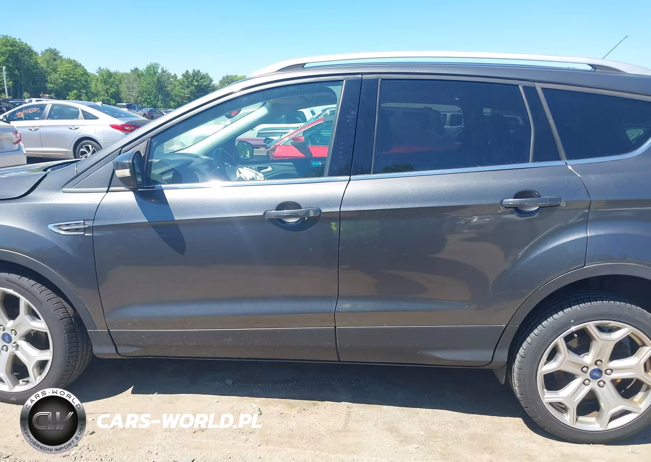 2017 Ford Escape Titanium VIN:1FMCU9J93HUD32453 - 13