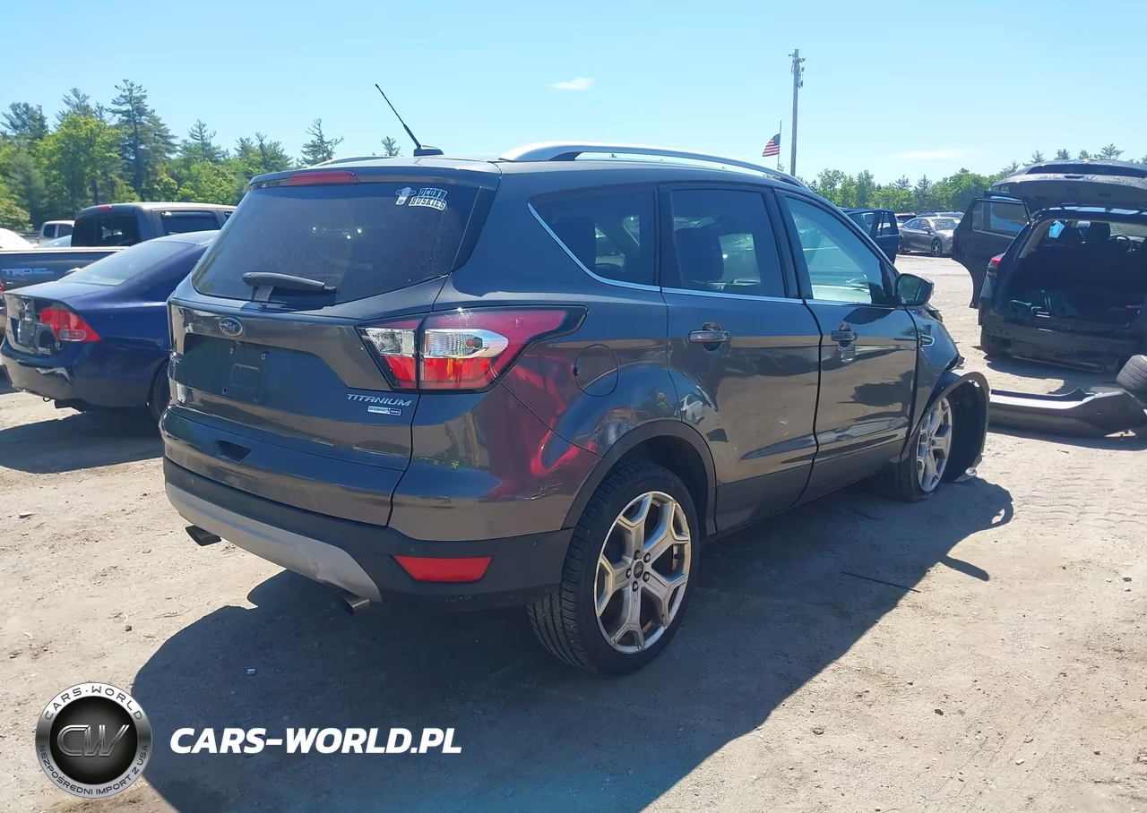 2017 Ford Escape Titanium VIN:1FMCU9J93HUD32453 - 4