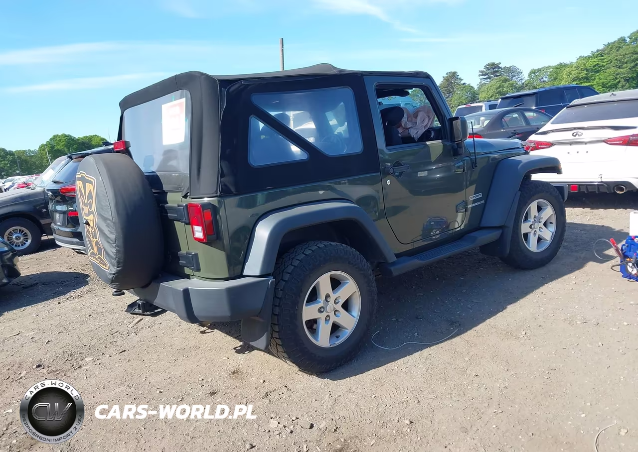 2015 Jeep Wrangler Sport VIN:1C4GJWAG2FL691839 - 4