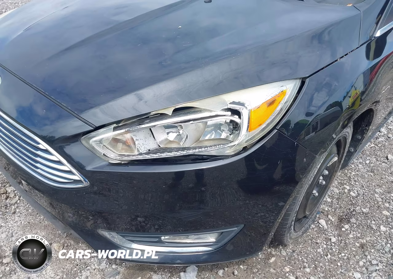 2015 Ford Focus Titanium VIN:1FADP3N23FL345108 - 14