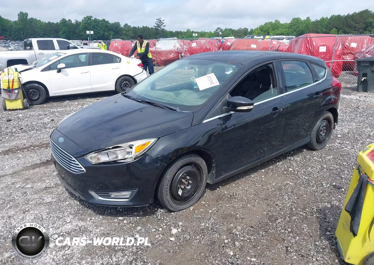 2015 Ford Focus Titanium VIN:1FADP3N23FL345108 - 2