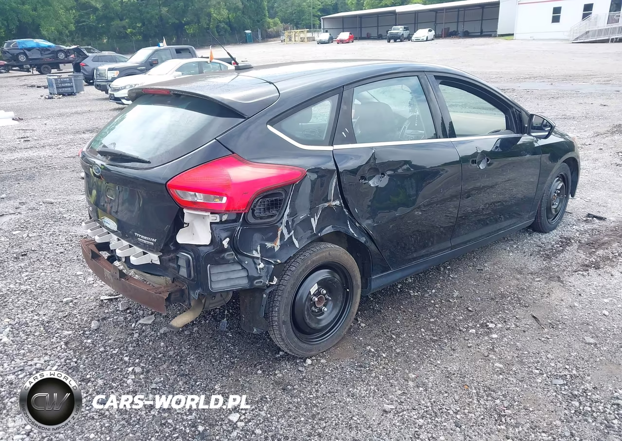 2015 Ford Focus Titanium VIN:1FADP3N23FL345108 - 4
