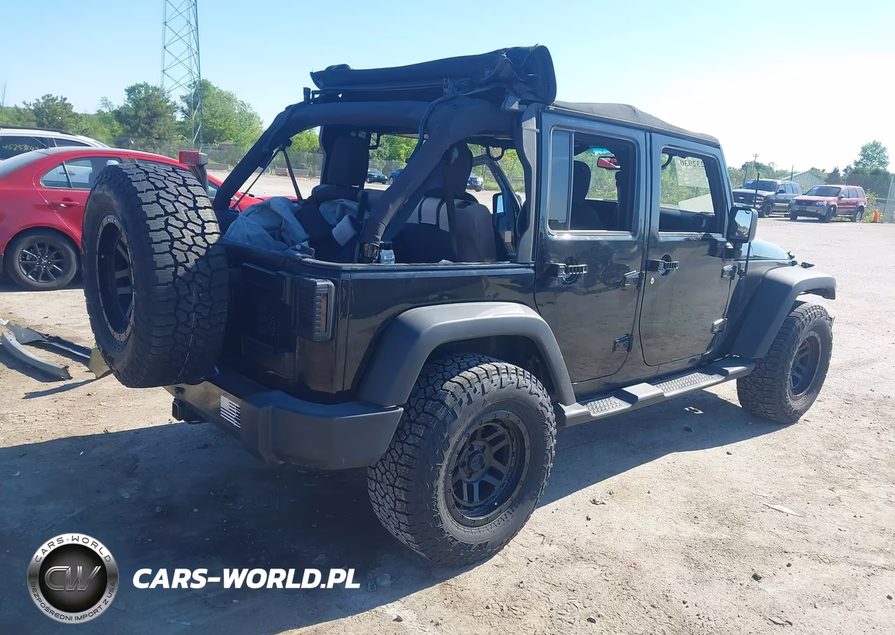 2015 Jeep Wrangler Unlimited Sport VIN:1C4BJWDG2FL695279 - 4