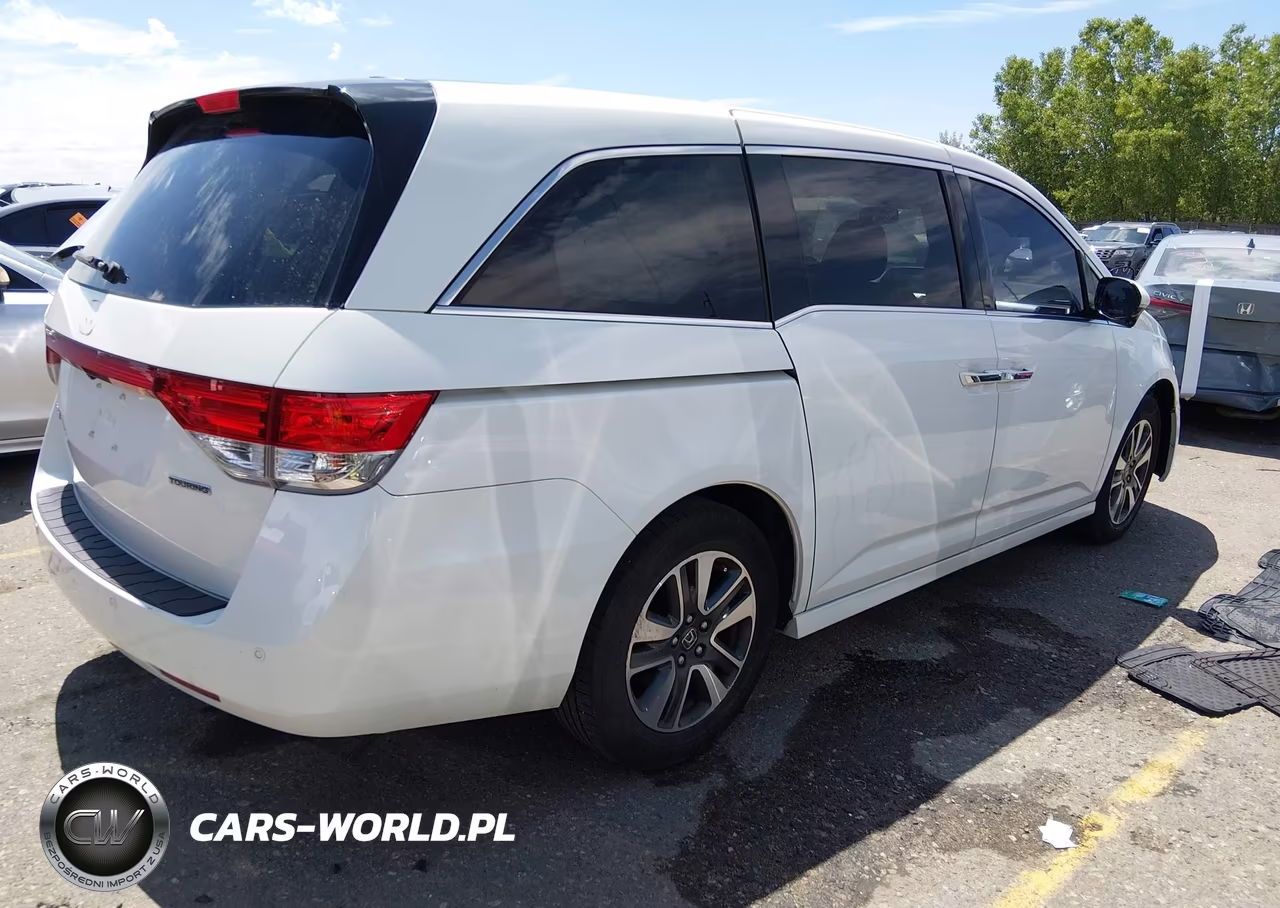 2014 Honda Odyssey Touring-Touring Elite VIN:5FNRL5H94EB097310 - 4