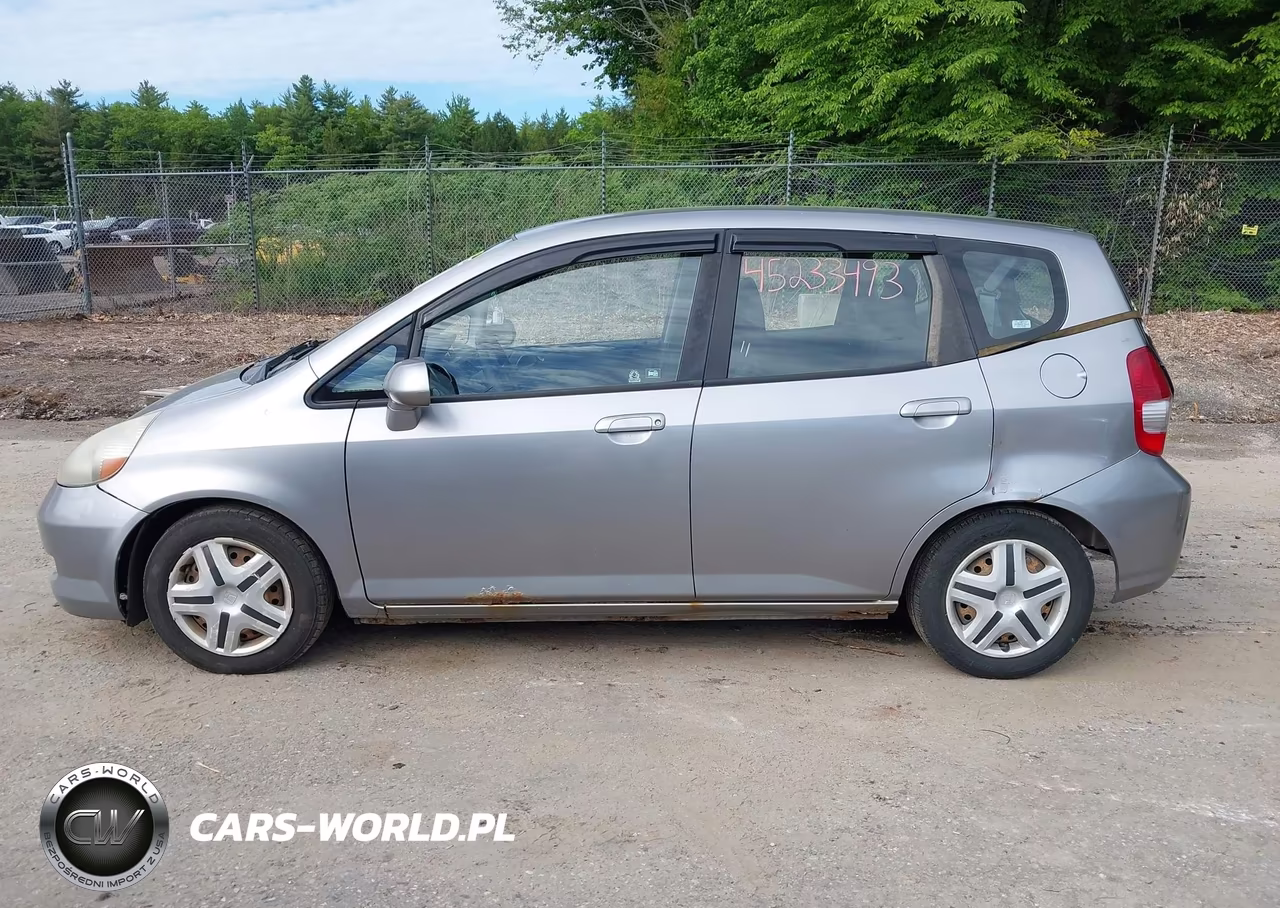 2007 Honda Fit VIN:JHMGD37457S000506 - 12