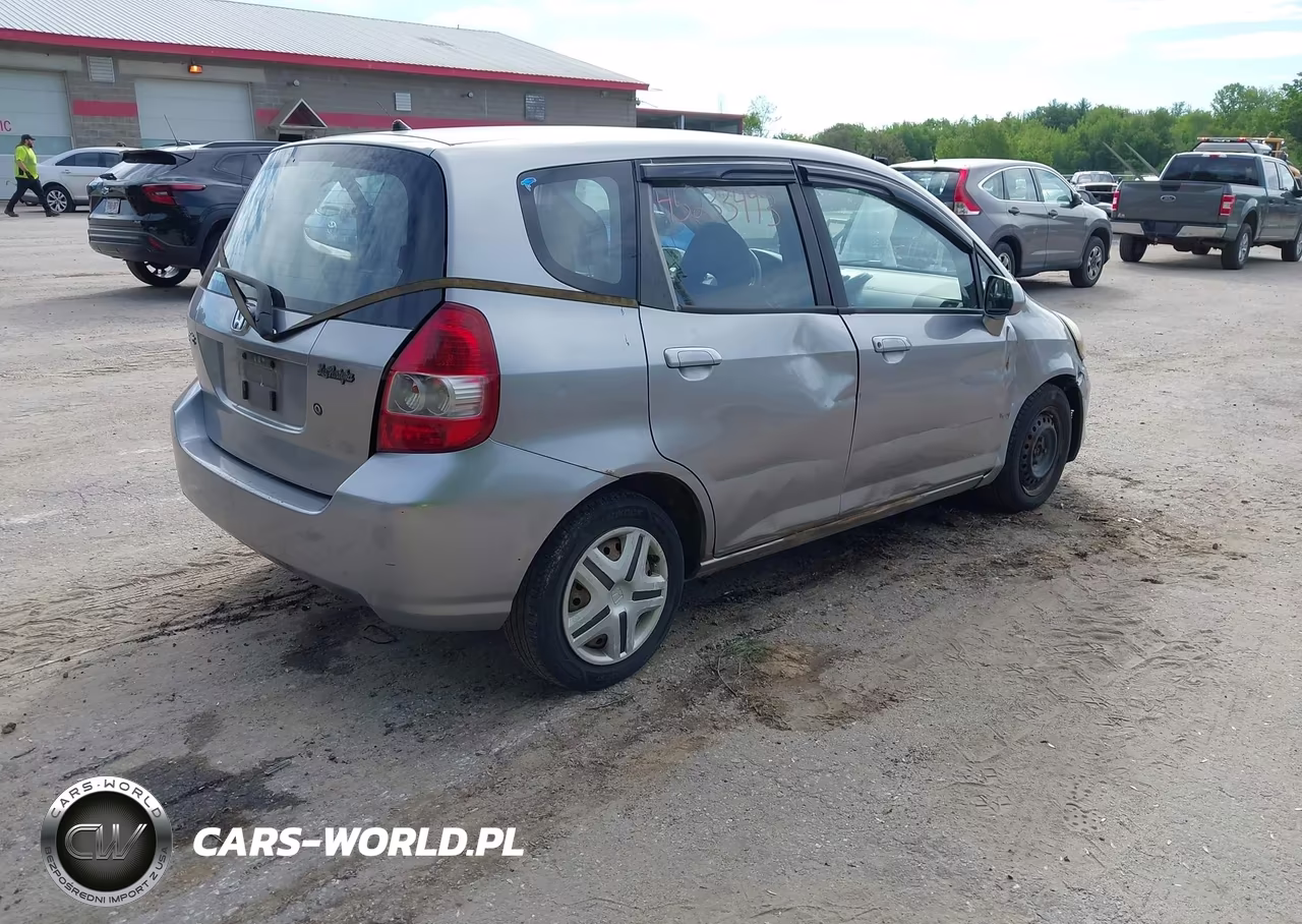 2007 Honda Fit VIN:JHMGD37457S000506 - 4