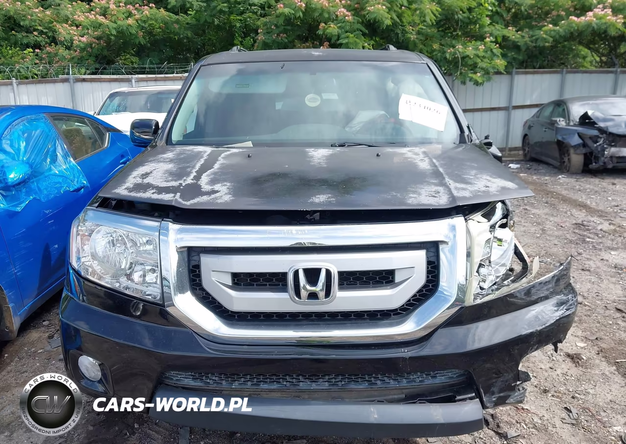 2011 Honda Pilot Touring VIN:5FNYF3H97BB038710 - 12