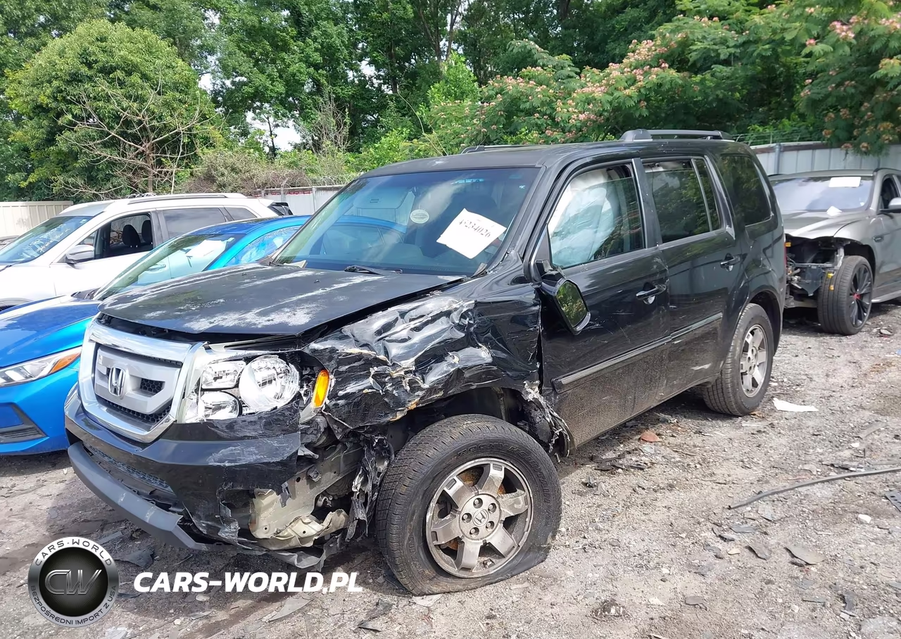 2011 Honda Pilot Touring VIN:5FNYF3H97BB038710 - 2