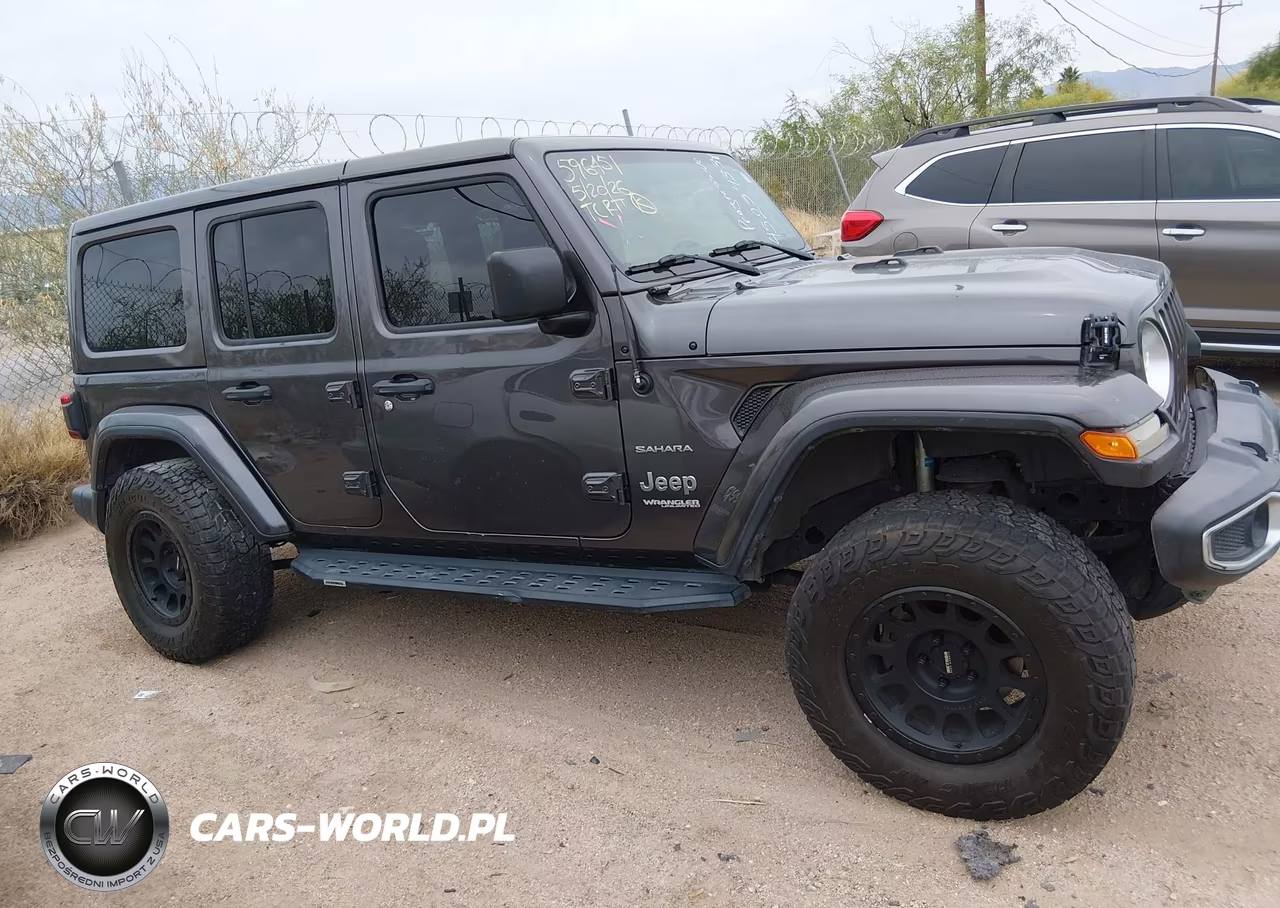 2018 Jeep Wrangler Unlimited Sahara 4X4 VIN:1C4HJXEG6JW165094 - 12