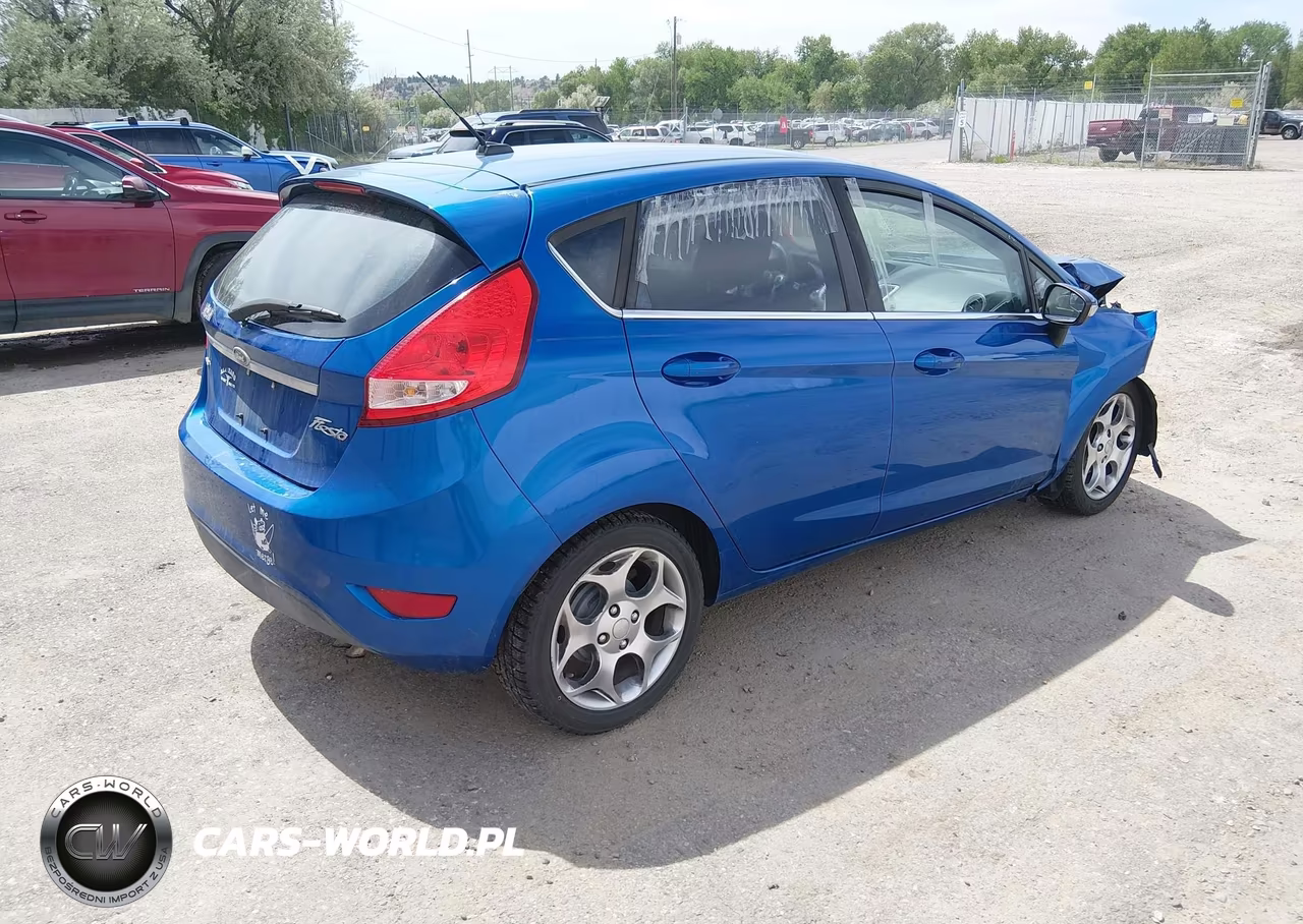 2011 Ford Fiesta Ses VIN:3FADP4FJ6BM148972 - 4
