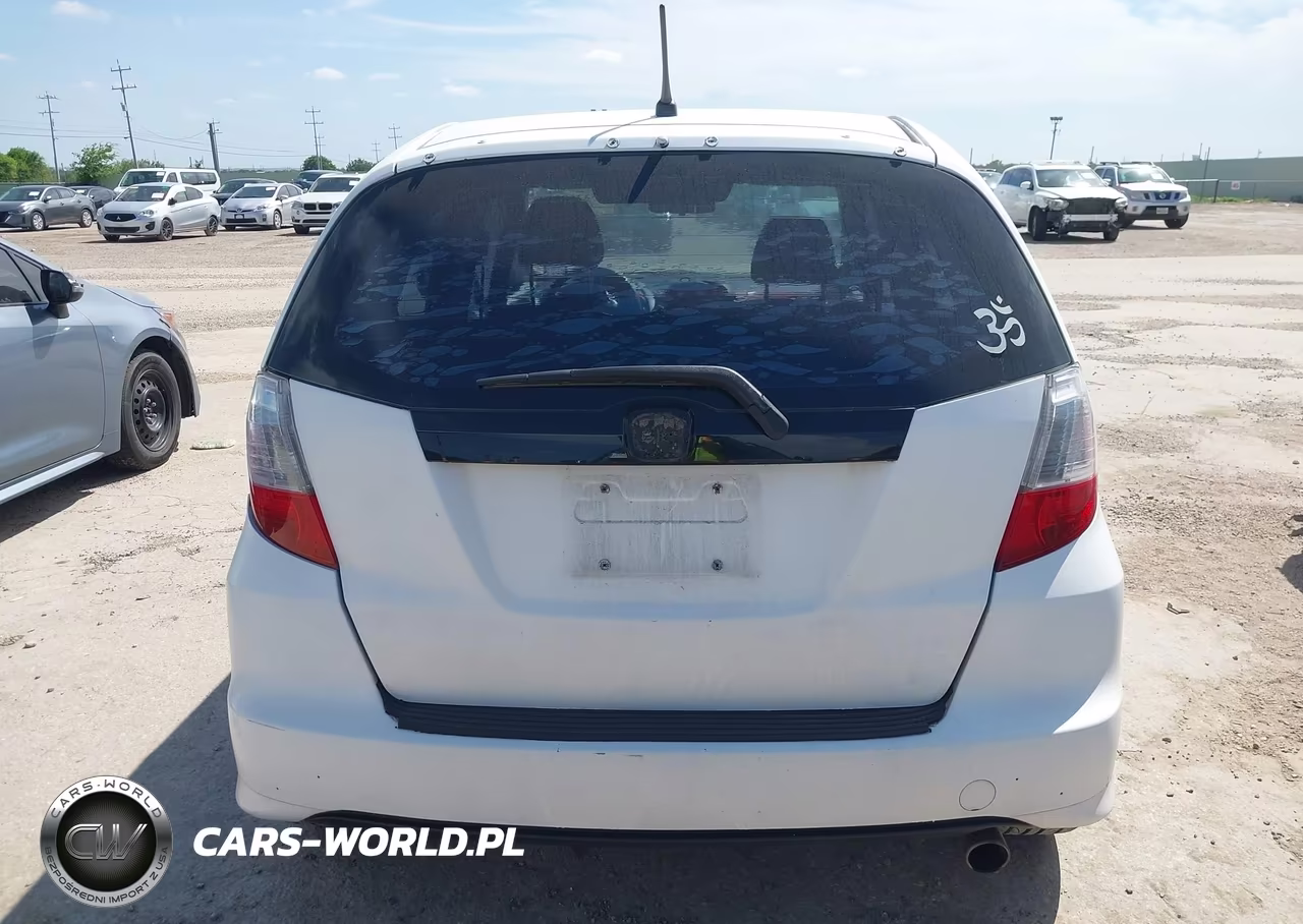 2009 Honda Fit Sport VIN:JHMGE88419S069401 - 16